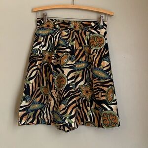 August silk vintage high rise 100% silk shorts
Floral animal print tan